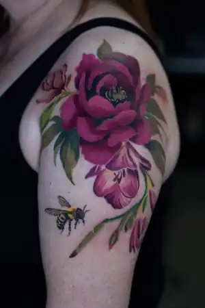 Colour peony and bee floral tattoo by Kristina Vishar